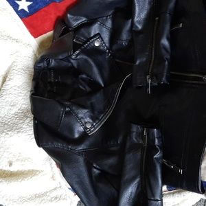Biker/goth  style faux leather jacket.